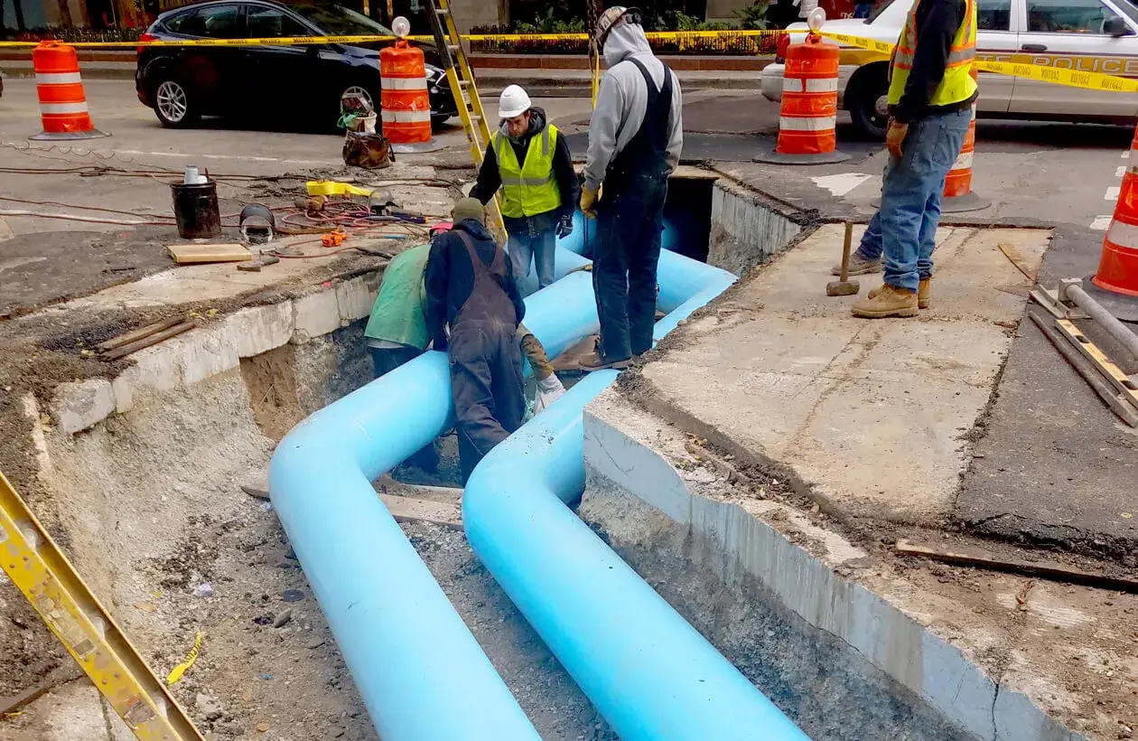 Large piping being installed under the streets in Chicago to connect to our plant.
