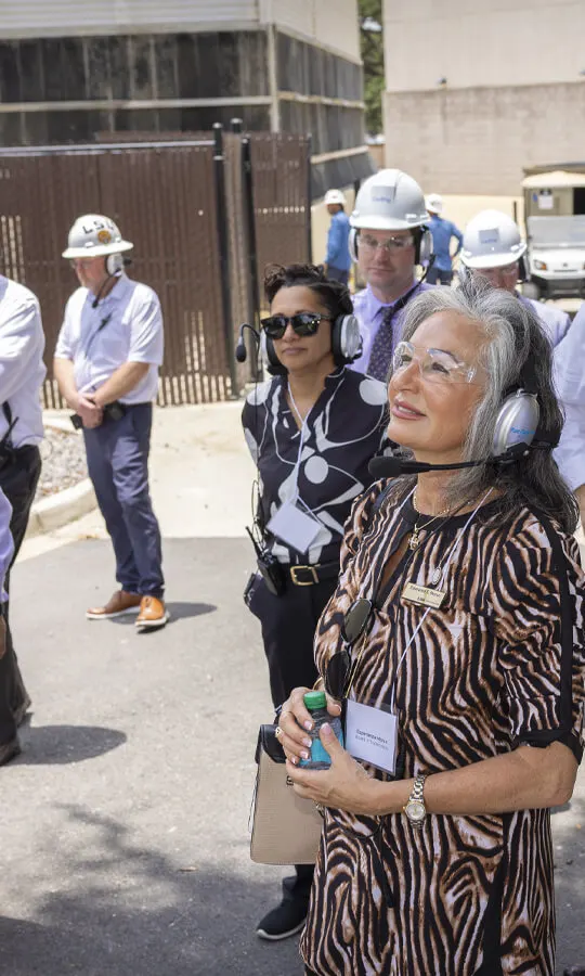 Photo of people looking around at our CenTrio/LSU plant at Louisiana State University during a plant tour.