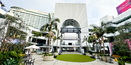 View of the Ovation Hollywood area with the Loews Hollywood Hotel in the background.