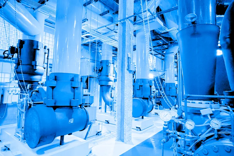 Blue color overlay photo showing the inside of a CenTrio Cooling Plant