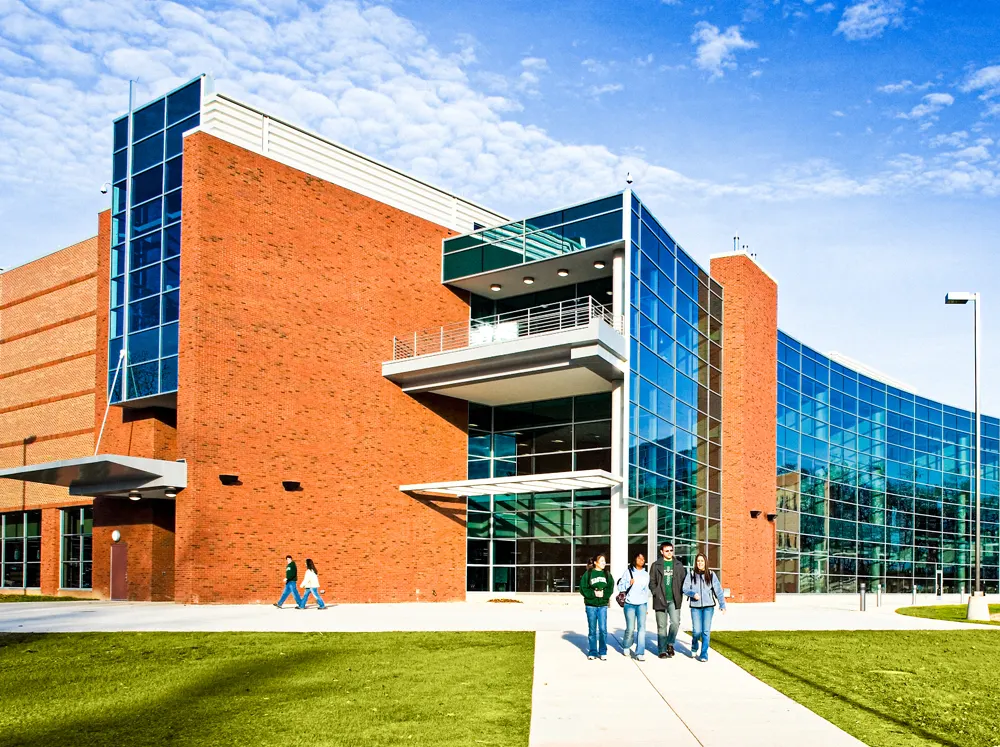 modern university campus buildings with green spaces supported by district energy infrastructure